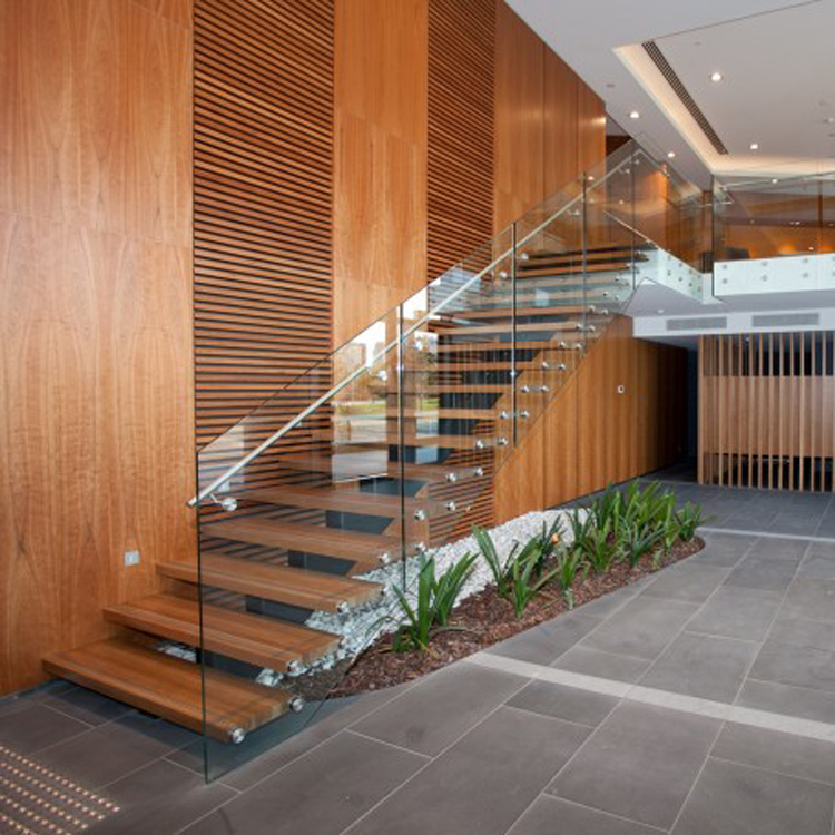 Glass balustrade wooden mono staircase